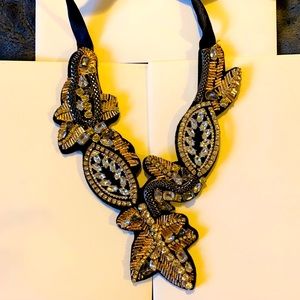 Black and gold costume jewelry necklace